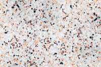 Vibrant Light Coral Terrazzo mural surface abstract composition playful stone particles.