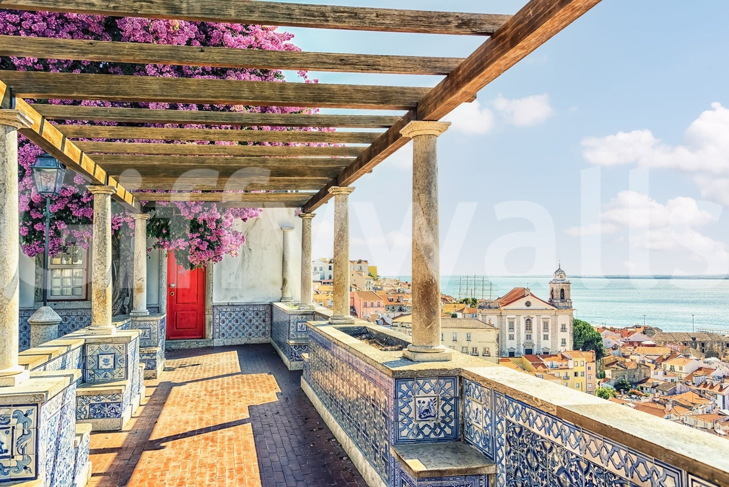 Lisbon vista bloom wall mural with tiled terrace, red door, and sea horizon view