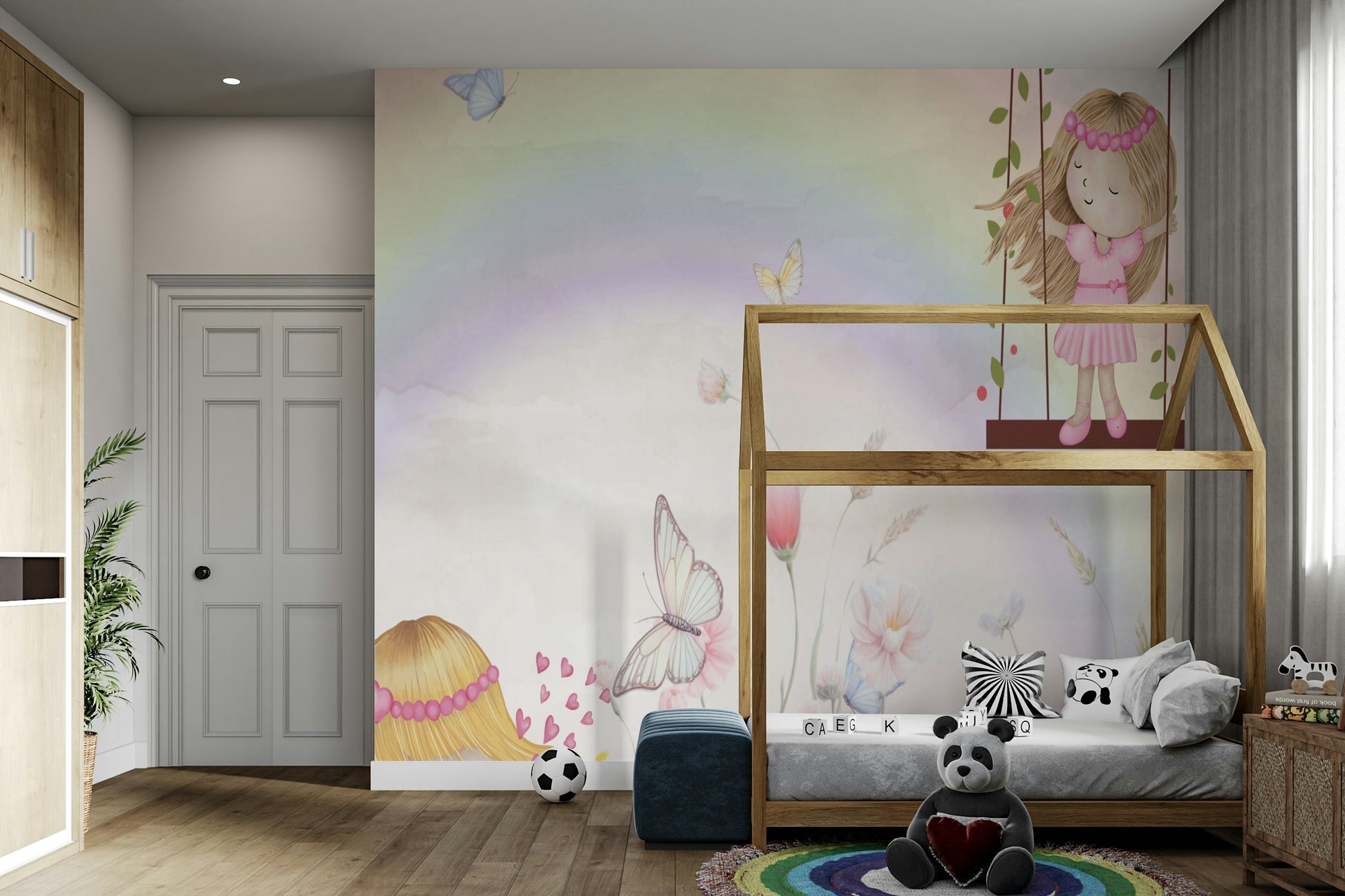 Little Girls Adventures wall mural of a rainbow and fairies above a wood house-frame bed with a panda plush