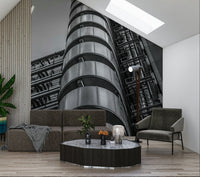  Building Futuristic design wall mural, numerous ducts and vents ascend toward bright sky background.
