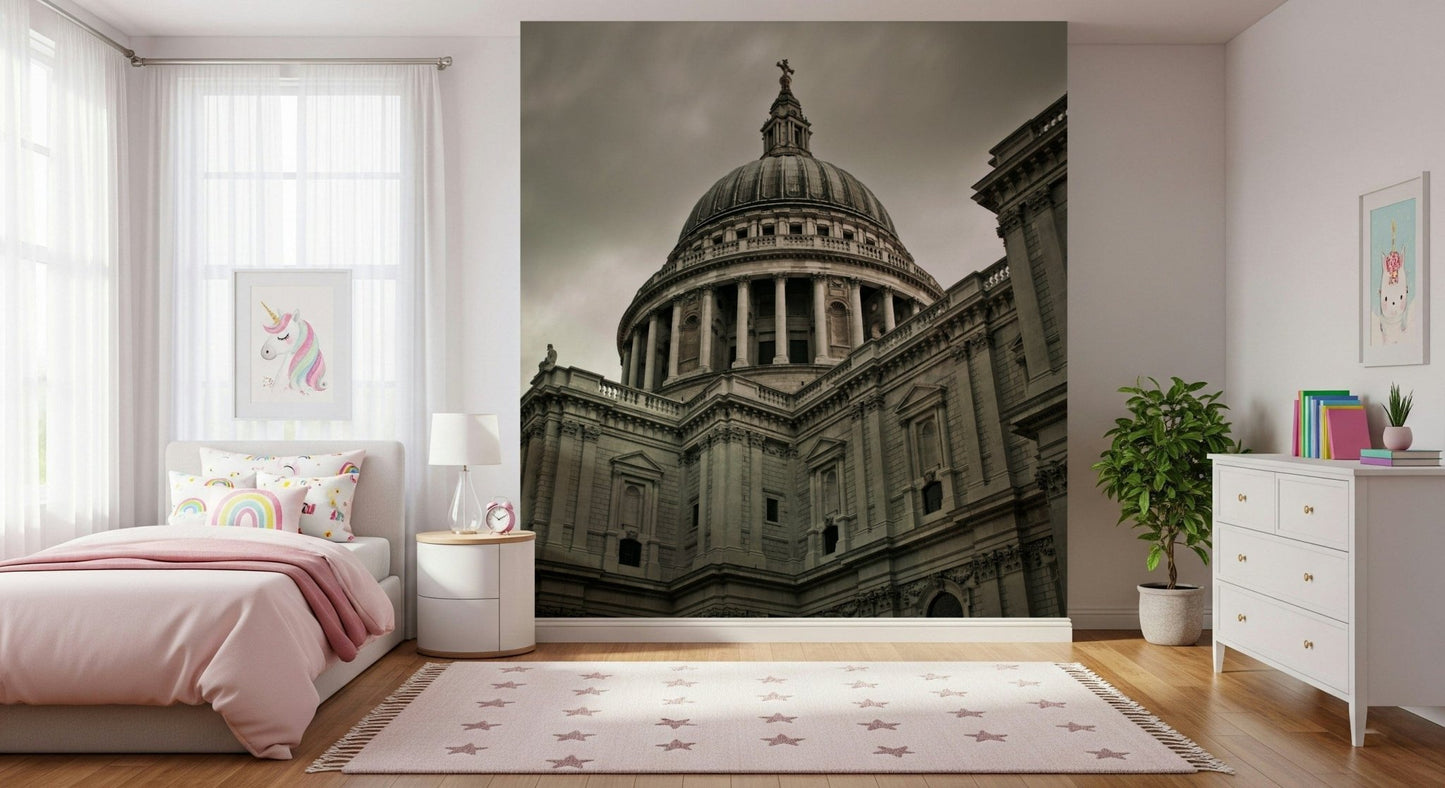 London Grandeur wallpaper mural of St Paul's behind a pink bed with rainbow pillows in a girls bedroom