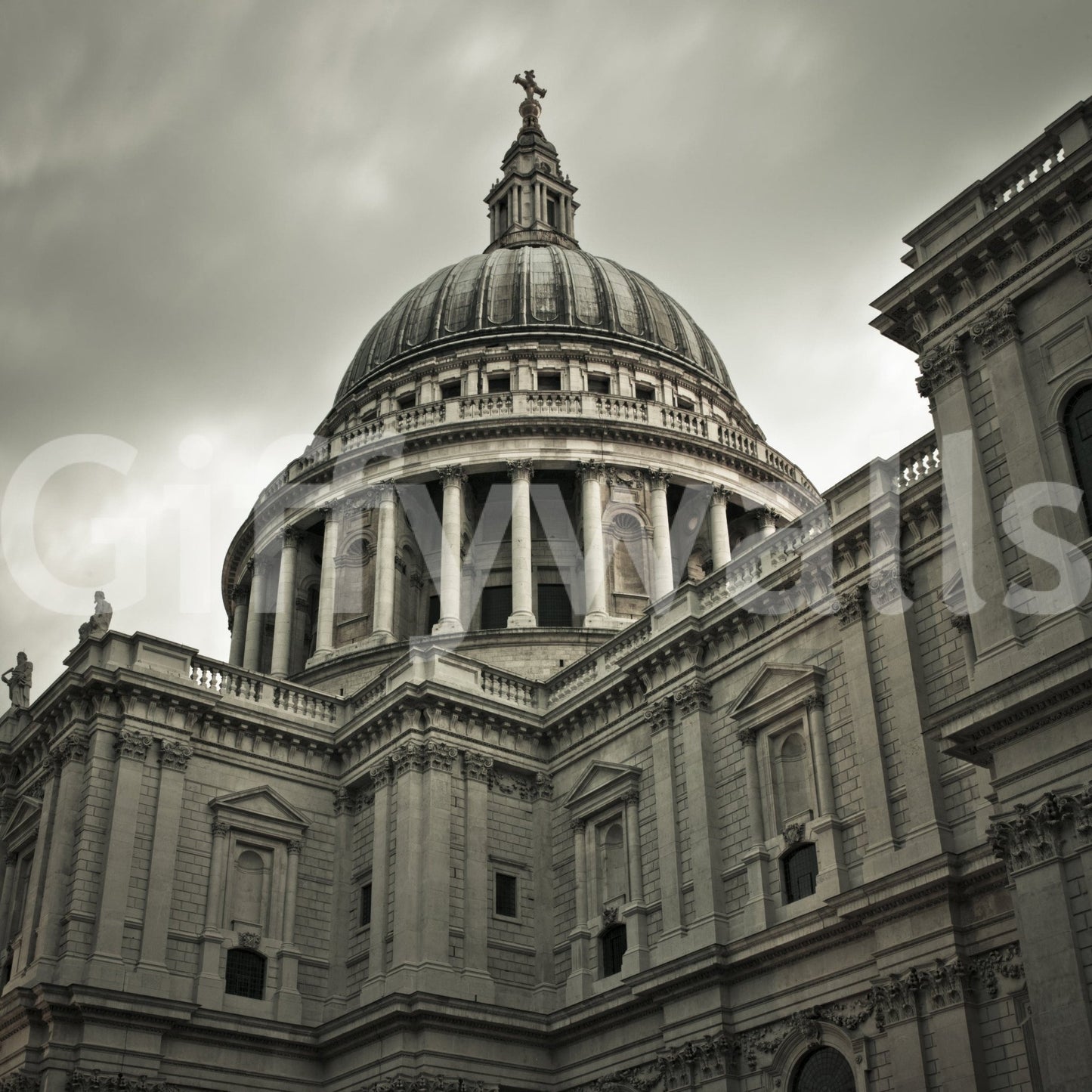 London Grandeur wallpaper mural showing St Paul's Cathedral dome and stone facade under a moody grey London sky