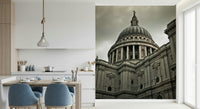 London Grandeur wallpaper mural of the cathedral dome beside a white kitchen with a breakfast table and blue chairs