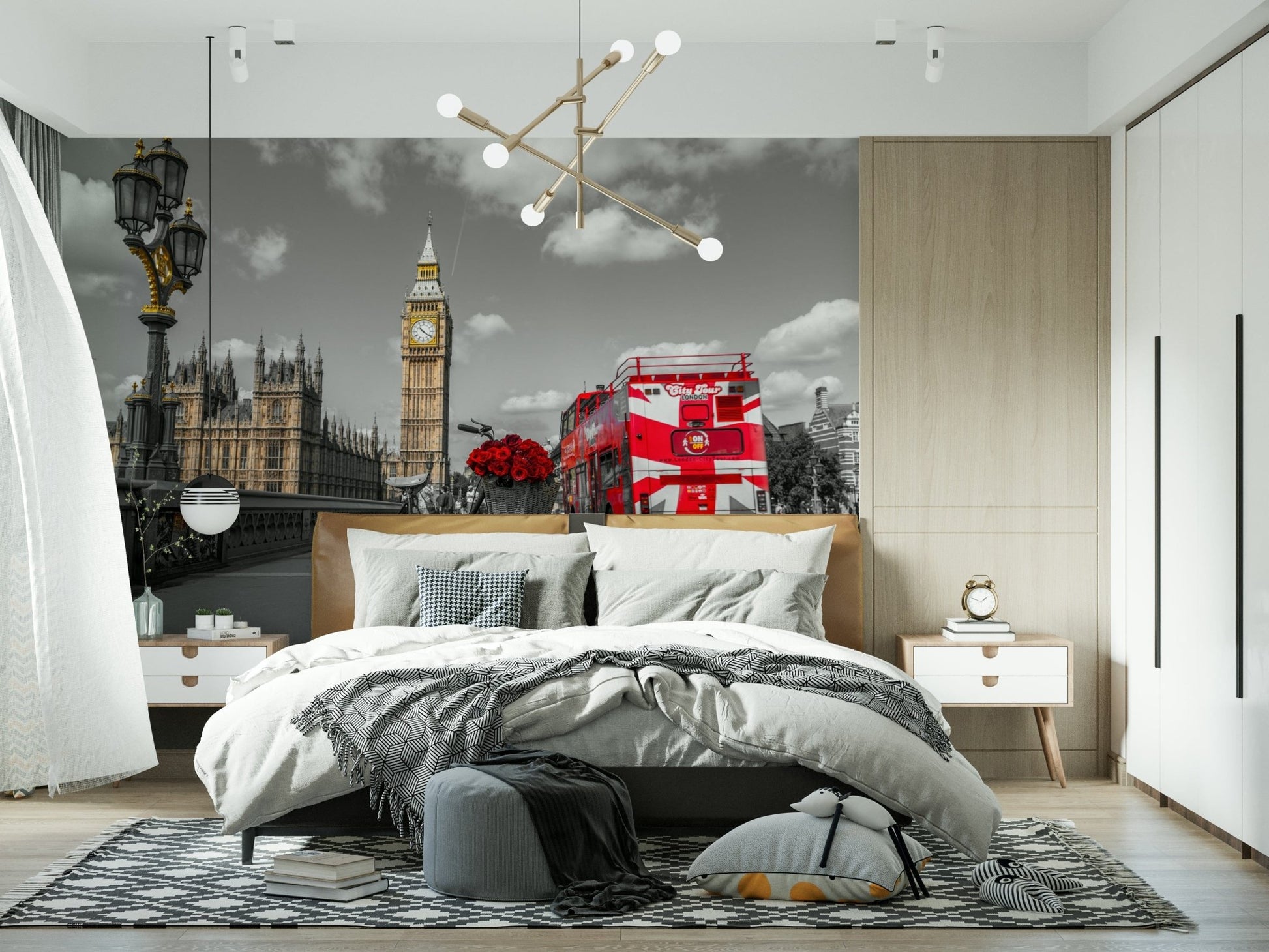 London Ride wallpaper mural in a modern bedroom with a brass chandelier and grey-and-white bedding