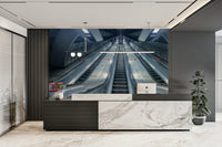 A high-angle view of the wall mural in a large space.

