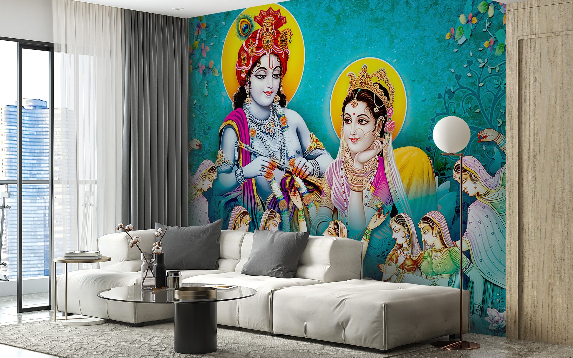 Lord Radhe Krishna and Gopis wallpaper mural in turquoise behind a white sofa and glass table in a living room