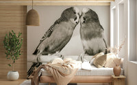 Sweet Lovebirds on a Perch wallpaper covering depicting intimate winged creature moment.