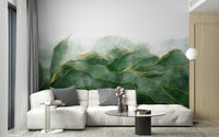Lush Green wallpaper mural styled as a feature wall behind a dining table and chairs in green tones