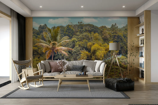A wall mural of a lush green mountain forest.

