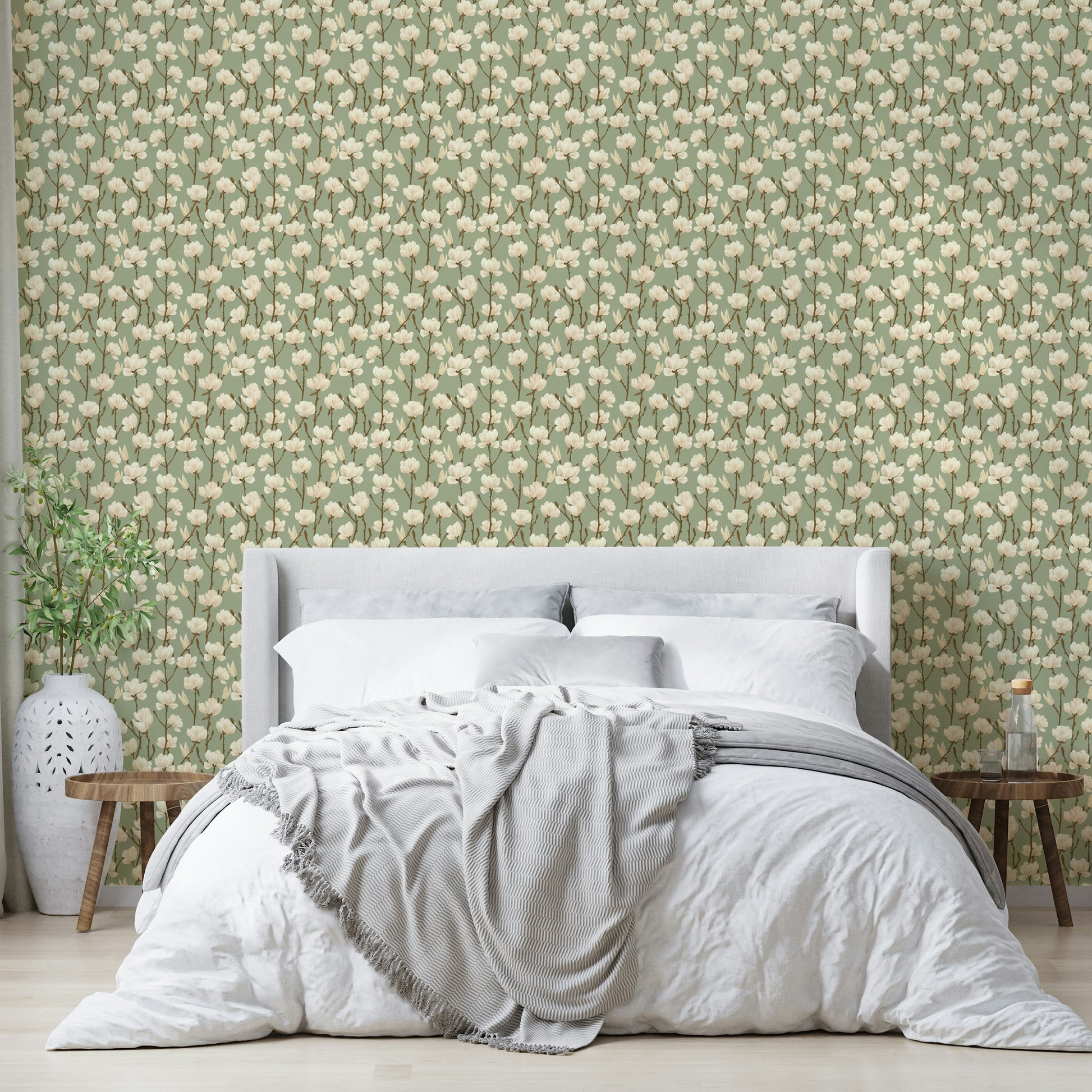 Earthy wallpaper featuring magnolia blossoms and foliage

