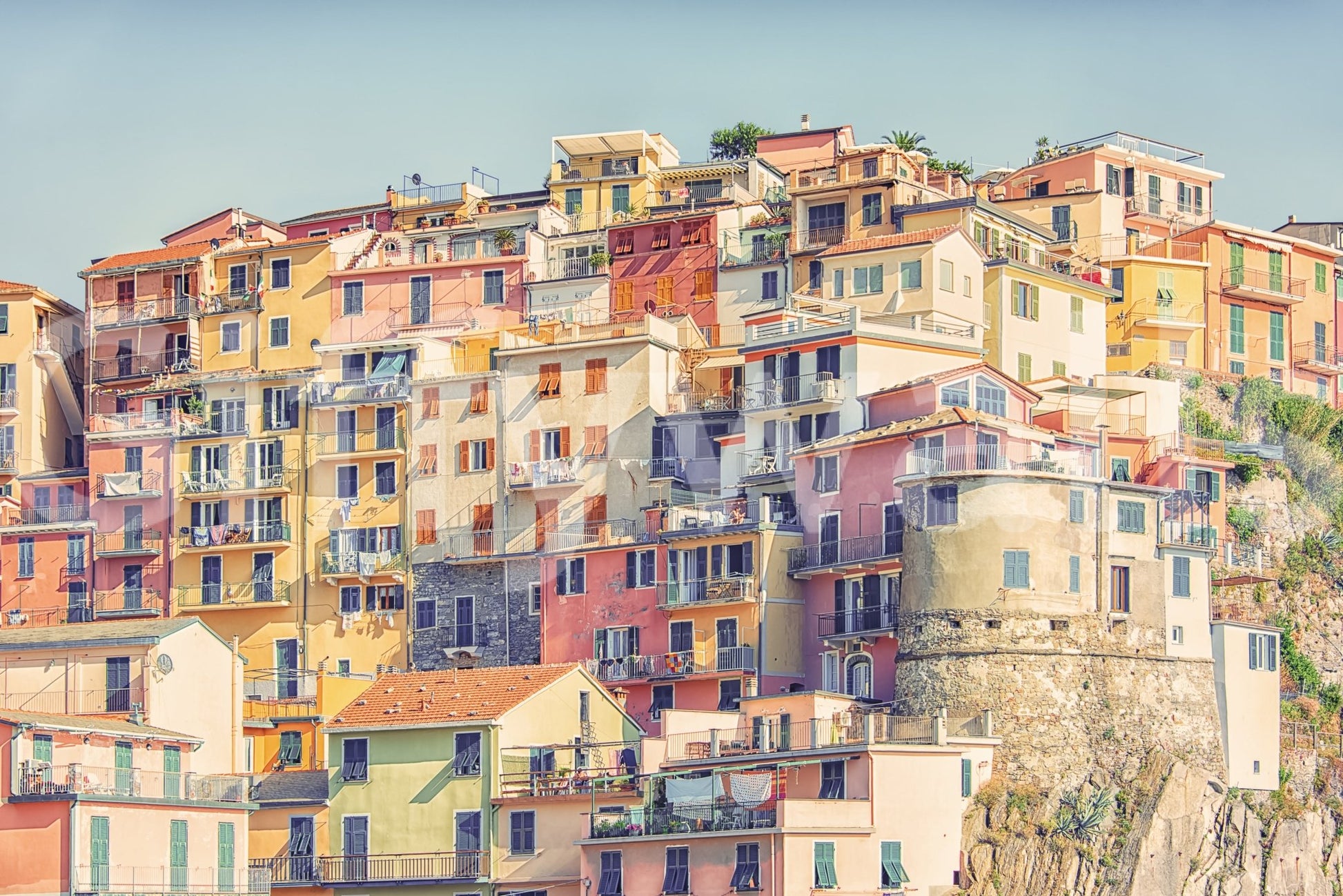 Manarola Vista wall mural close-up of Manarola's pastel houses stacked up the Cinque Terre cliffside