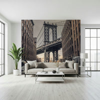Bridge from Dumbo view wall mural, cobblestone street, towering brick buildings.