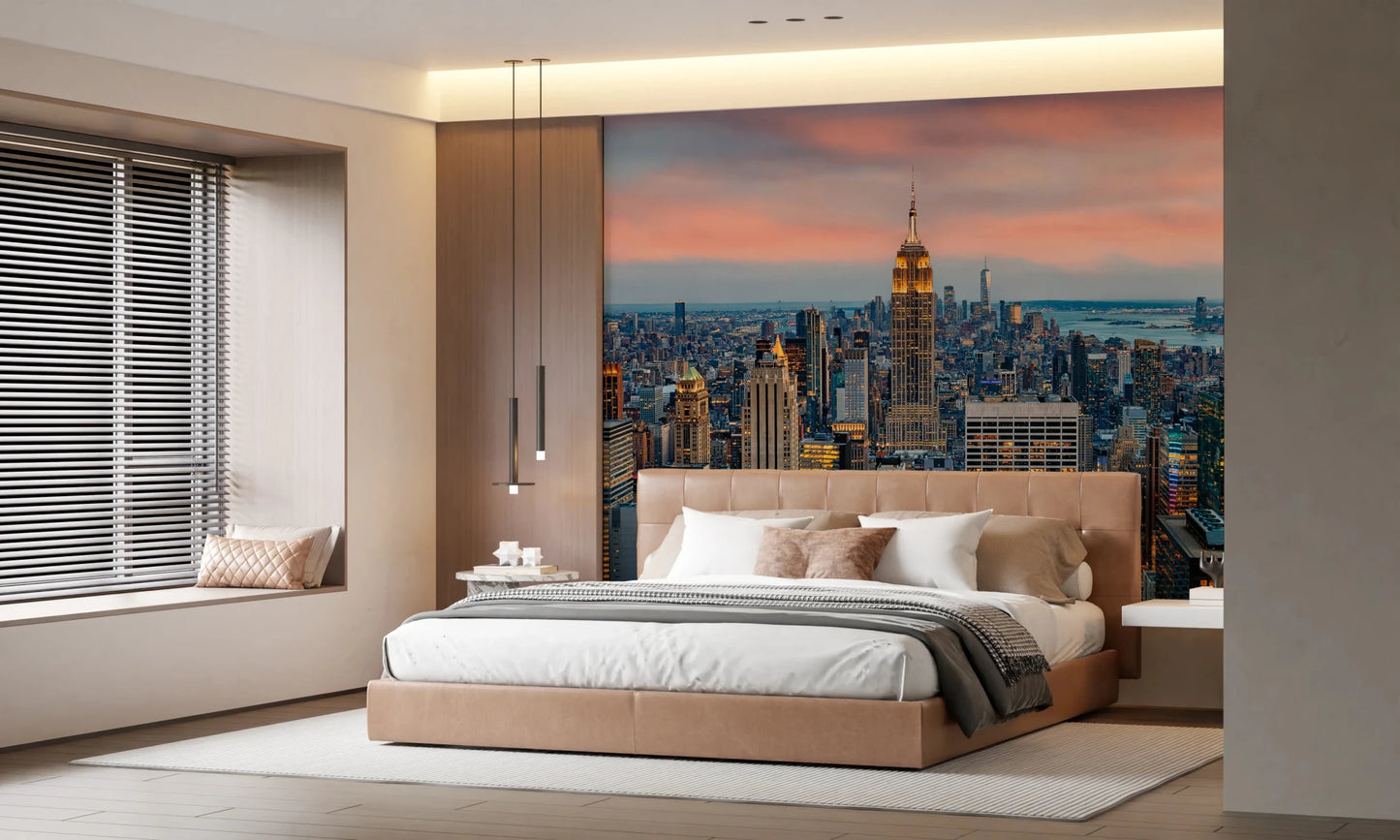 Manhattan Dawn wallpaper mural of Manhattan at dusk behind a camel upholstered bed with pendant lights