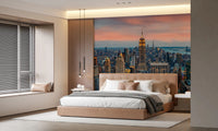 Manhattan Dawn wallpaper mural of Manhattan at dusk behind a camel upholstered bed with pendant lights