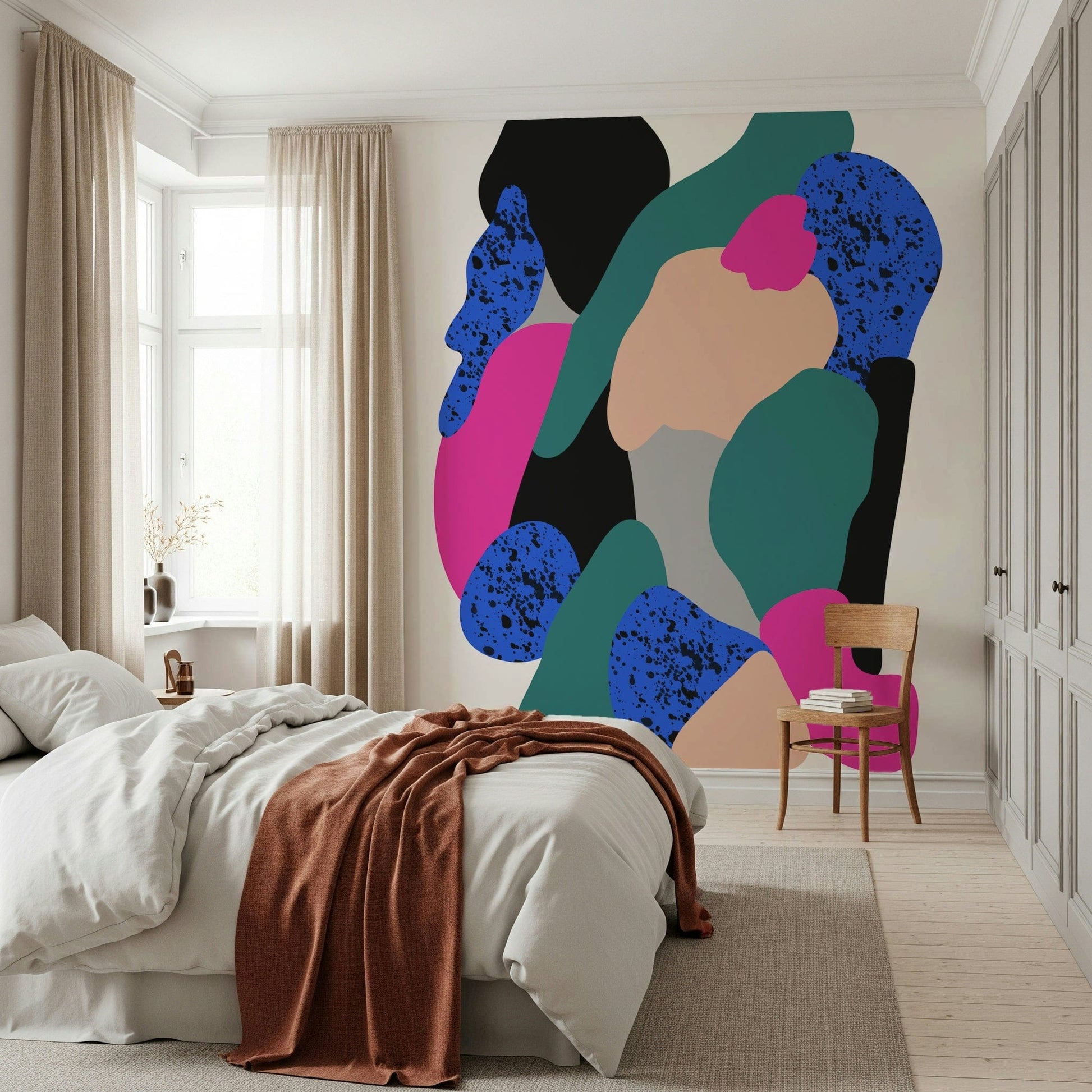 A sculptural abstract wallpaper with curving color forms and playful paint-splatter details.