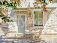 Mediterranean Doorway Charm Wall Mural highlighting soft pastel florals.