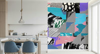 Energetic wallpaper featuring bold multicolored forms, dots, and stripes in a lively abstract style.