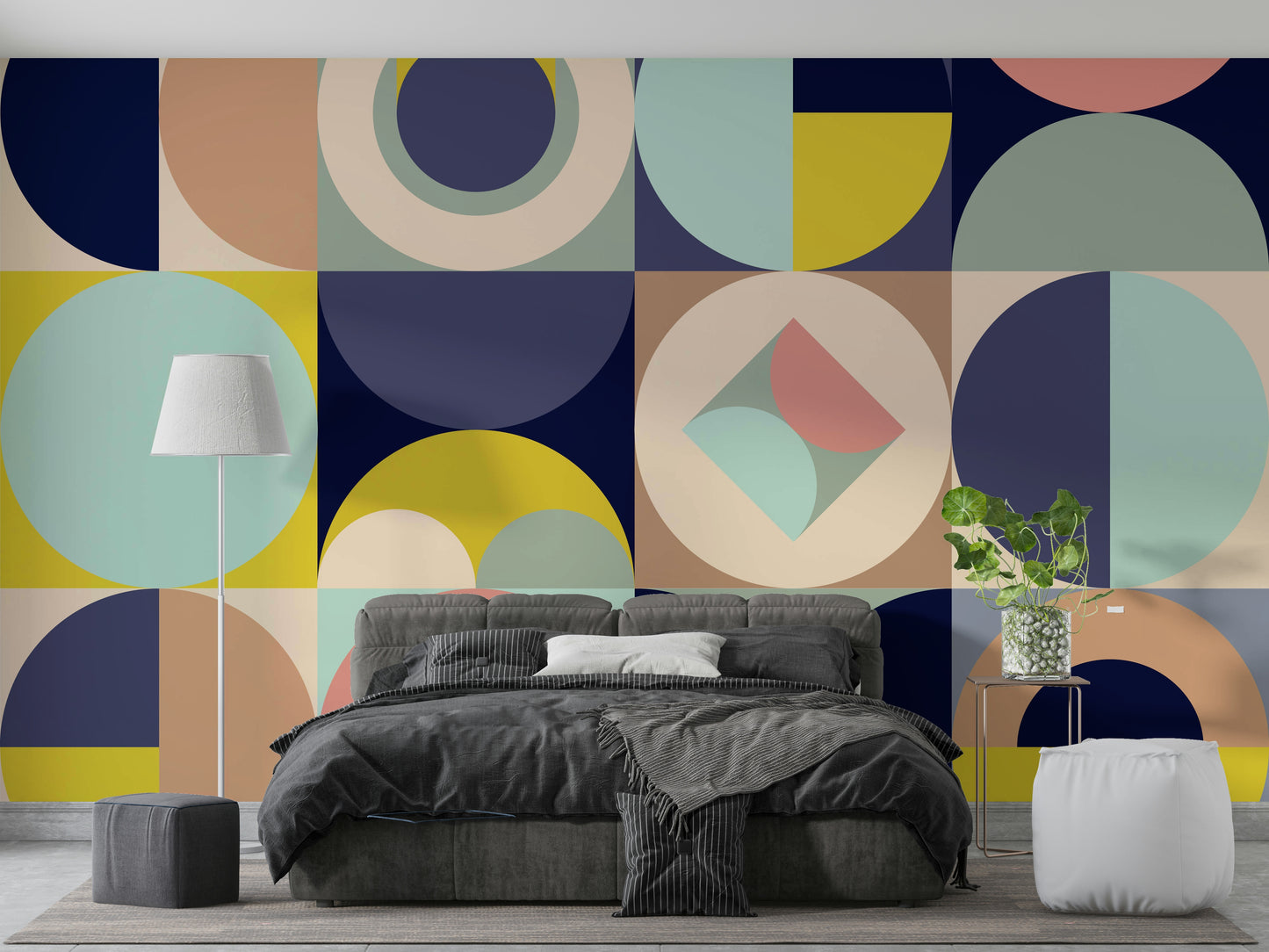 Mescolanza Alt V3 wallpaper mural in navy and yellow geometric pattern behind a grey velvet bed in a modern bedroom