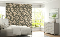 Patterned wallpaper featuring stylized cream flower bursts in a bold retro design.