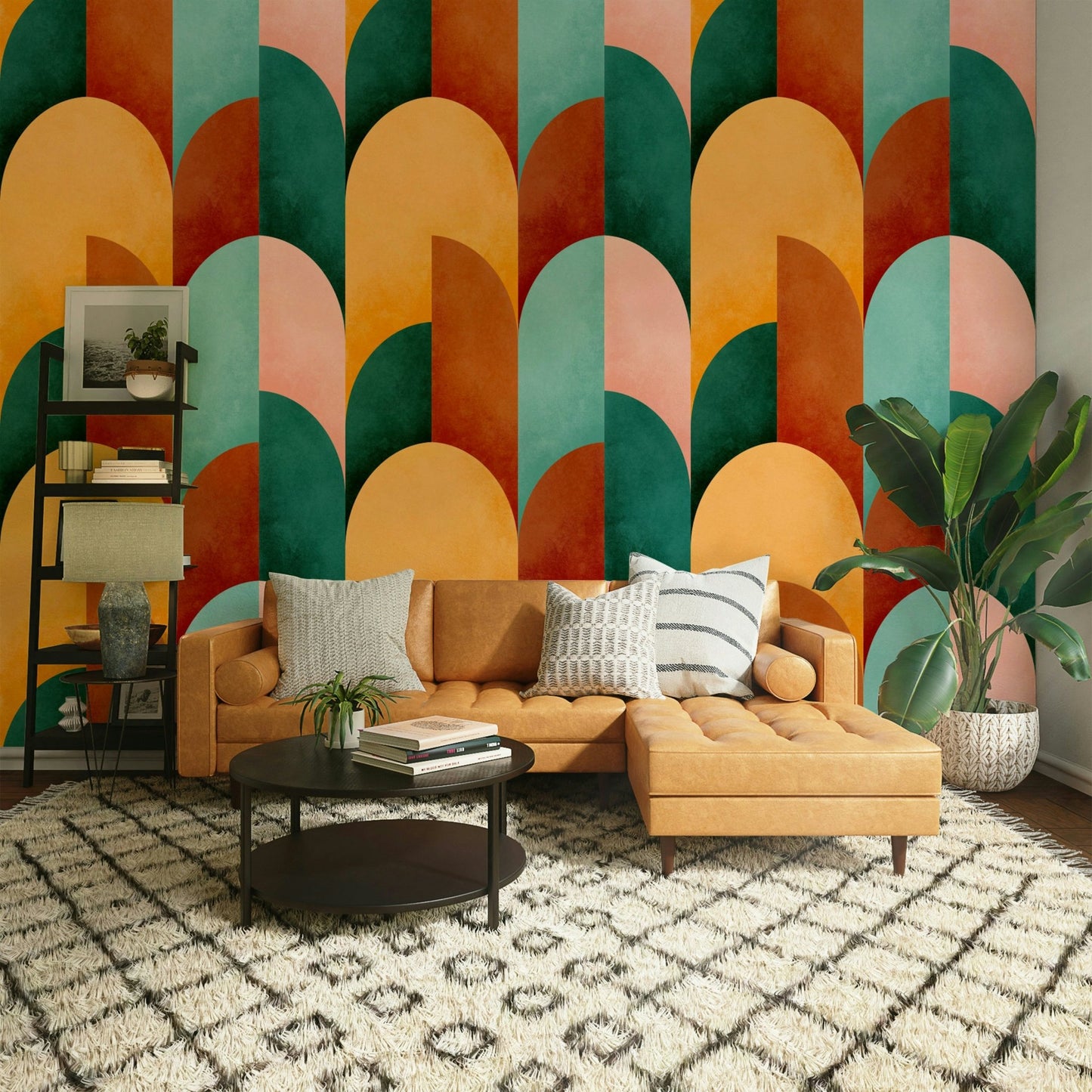 Mid Mod Geometry Sunburn wallpaper mural behind a tan leather sofa and chaise on a Moroccan shag rug