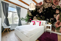 The design has a layered, artistic look with soft focus on some elements.

