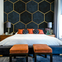 Metallic hexagonal pattern wall mural in luxurious midnight blue.

