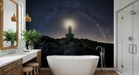 Celestial Beacon Wall Mural — tranquil night scene with stars and a guiding lighthouse.