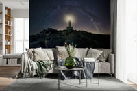 Decorative wall mural showcasing a radiant beacon illuminating a cosmic, celestial landscape.