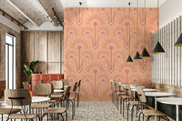 Botanical elements are intertwined in the design.
