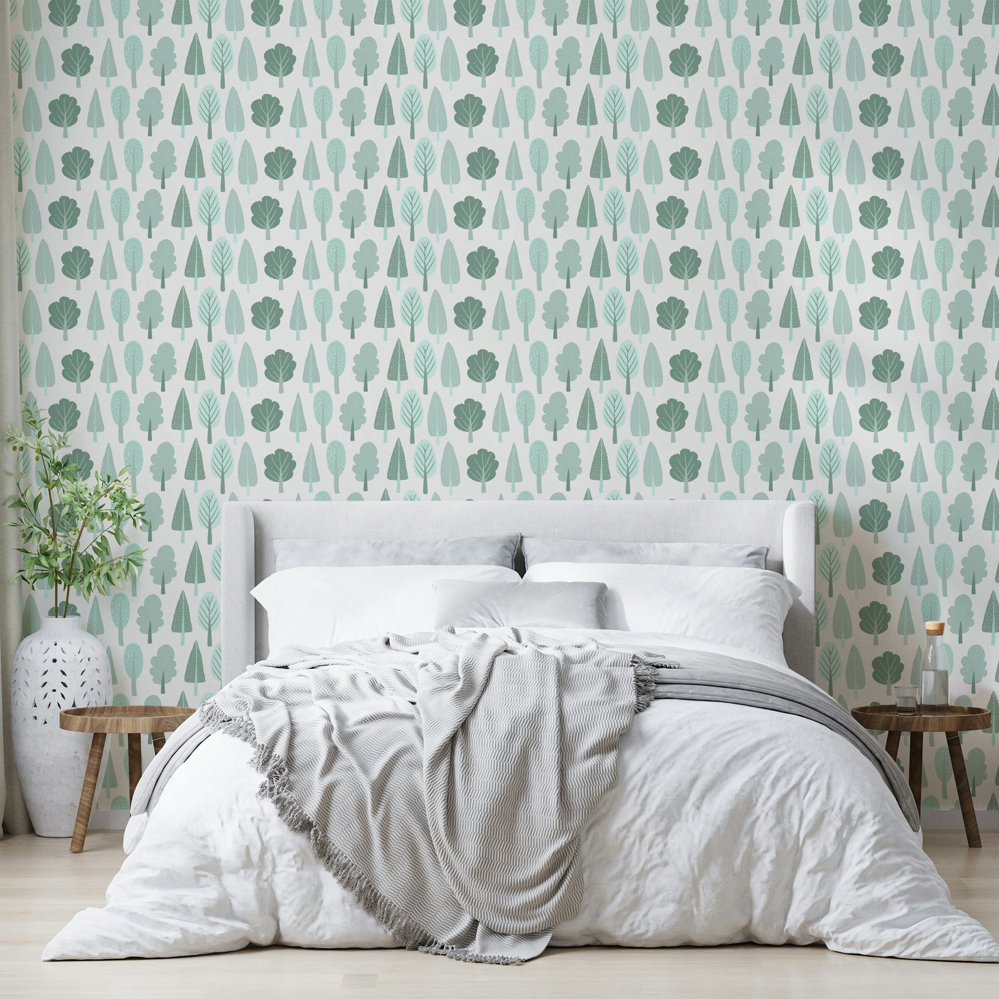 Soft green wallpaper featuring minimalist trees

