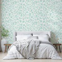 Subtle mint branch wallpaper for a serene bedroom.