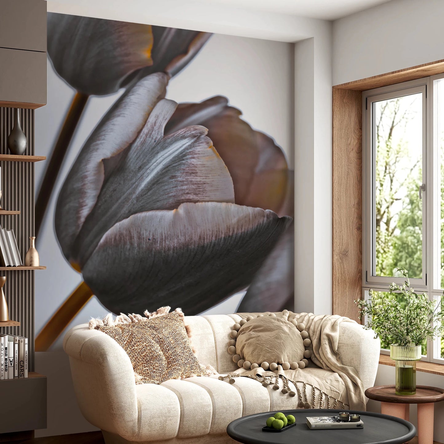 Miracle Tulips wall mural of moody tulip petals behind a cream curved sofa with a pom-pom cushion and knit throw