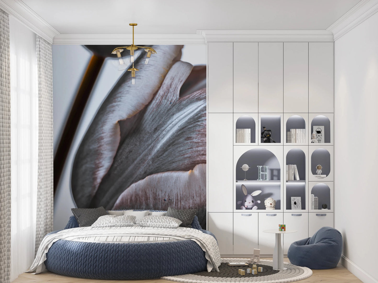 Miracle Tulips wall mural of dusky tulips behind a round navy bed with a brass chandelier in a child's bedroom