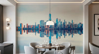Mirrored Metropolis wallpaper mural of the mirrored skyline in a dining room with a round table and grey chairs