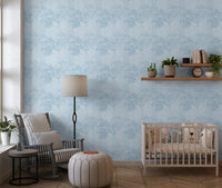 Misty BlueLeaf wallpaper showing soft tropical leaf pattern