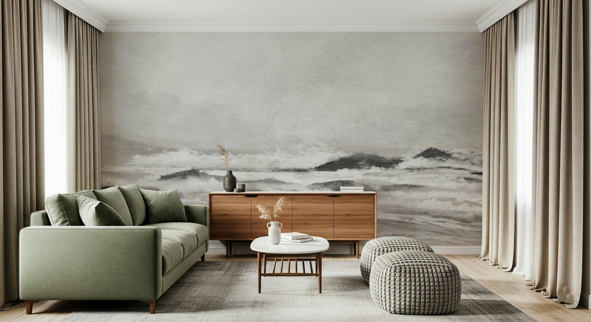 Misty Coast wallpaper mural in grey behind a sage green sofa and walnut sideboard in a curtained living room