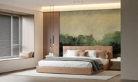 Misty Glen wallpaper mural of a soft green treeline behind a tan leather bed in a modern bedroom