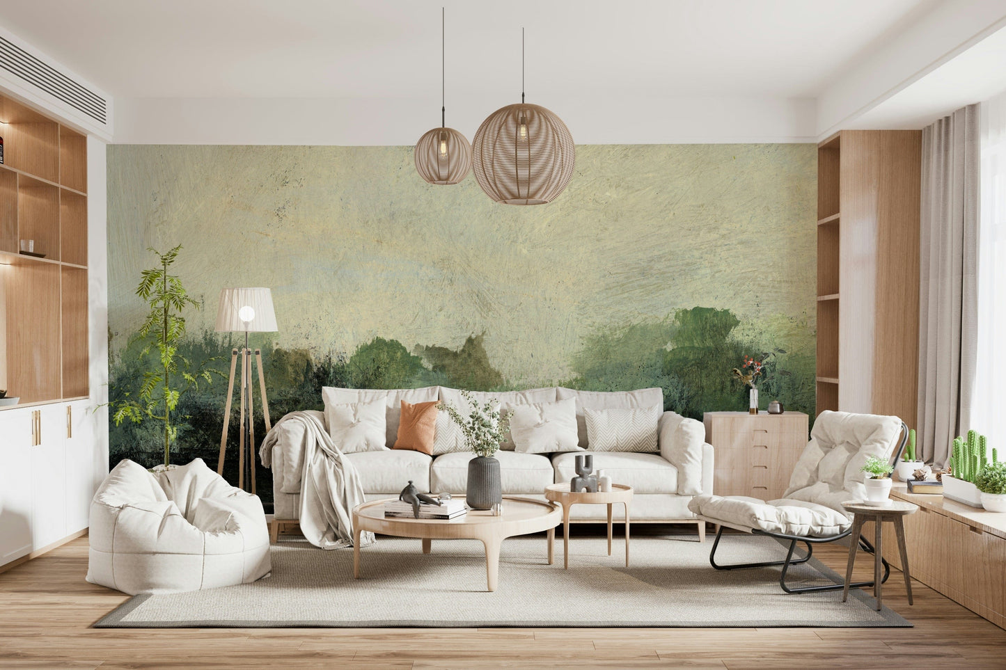 Misty Glen wallpaper mural of a soft green landscape behind a cream sofa with woven globe pendant lights