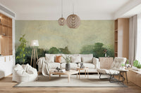 Misty Glen wallpaper mural of a soft green landscape behind a cream sofa with woven globe pendant lights