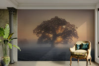 A wall mural of a misty sunrise scene.

