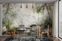 Misty Tropical Jungle wall mural with green palm trees and pale mountains behind a wooden dining table in a dining room