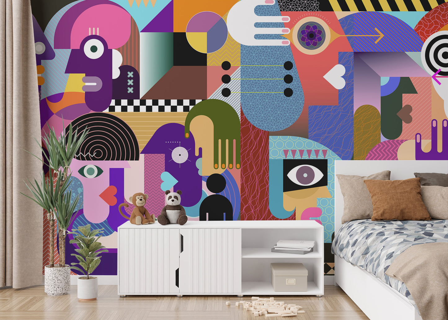Modern Abstract People Collage wallpaper mural in a kids bedroom behind a white bed and toy-topped console