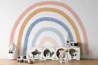 Cheerful rainbow mural in a light-filled bedroom

