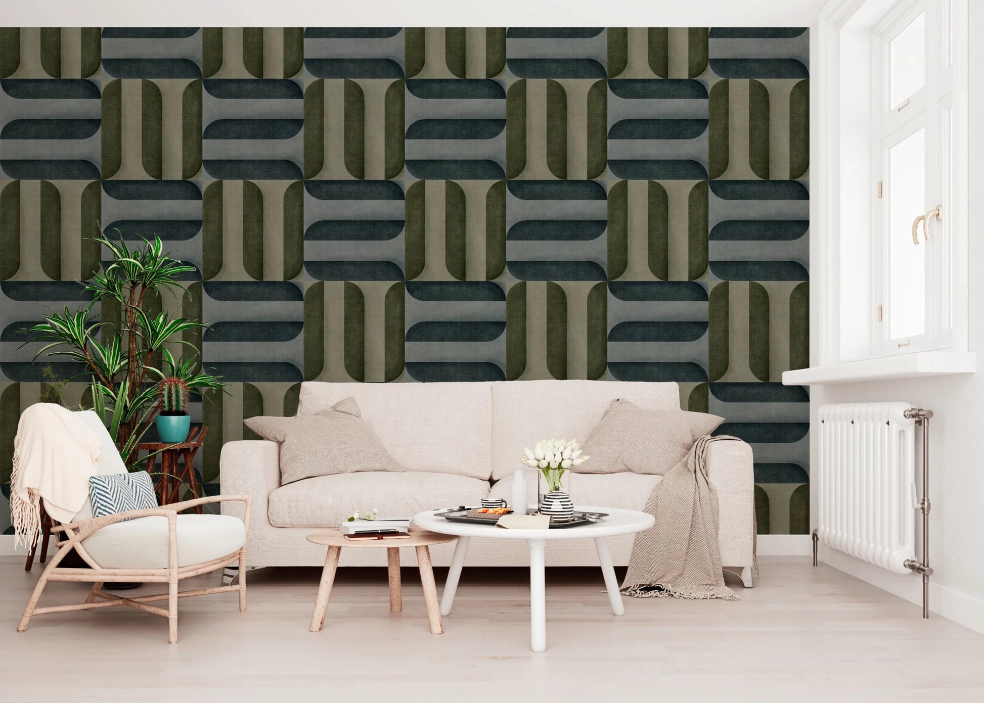 Modern Textured Signs Winter wallpaper in green and charcoal shapes behind a cream sofa and cane armchair in a living room
