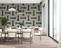 Modern Textured Tiles Vintage Denim wallpaper in teal and cream behind white chairs in a sunlit dining room