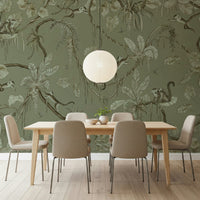 Nature-inspired wall art with monkeys perched on leafy jungle branches