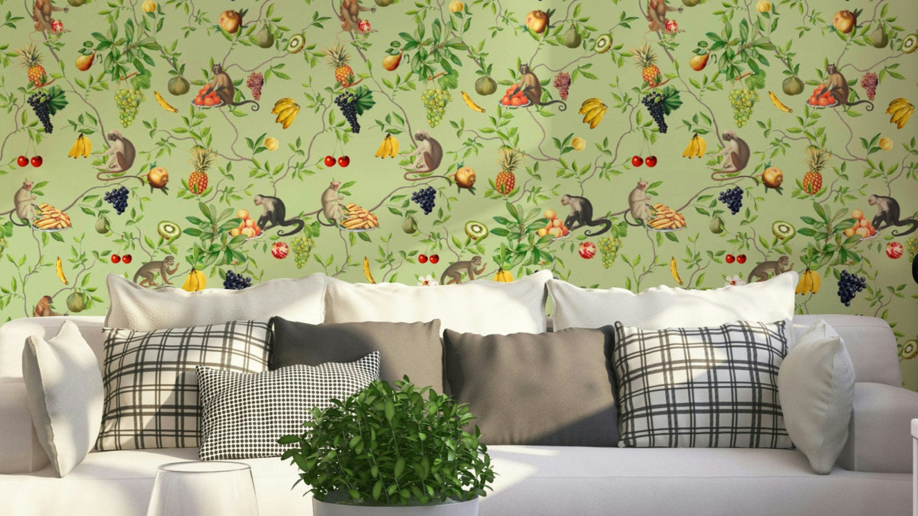 Tropical jungle wallpaper with cheeky monkeys and lush fruits.

