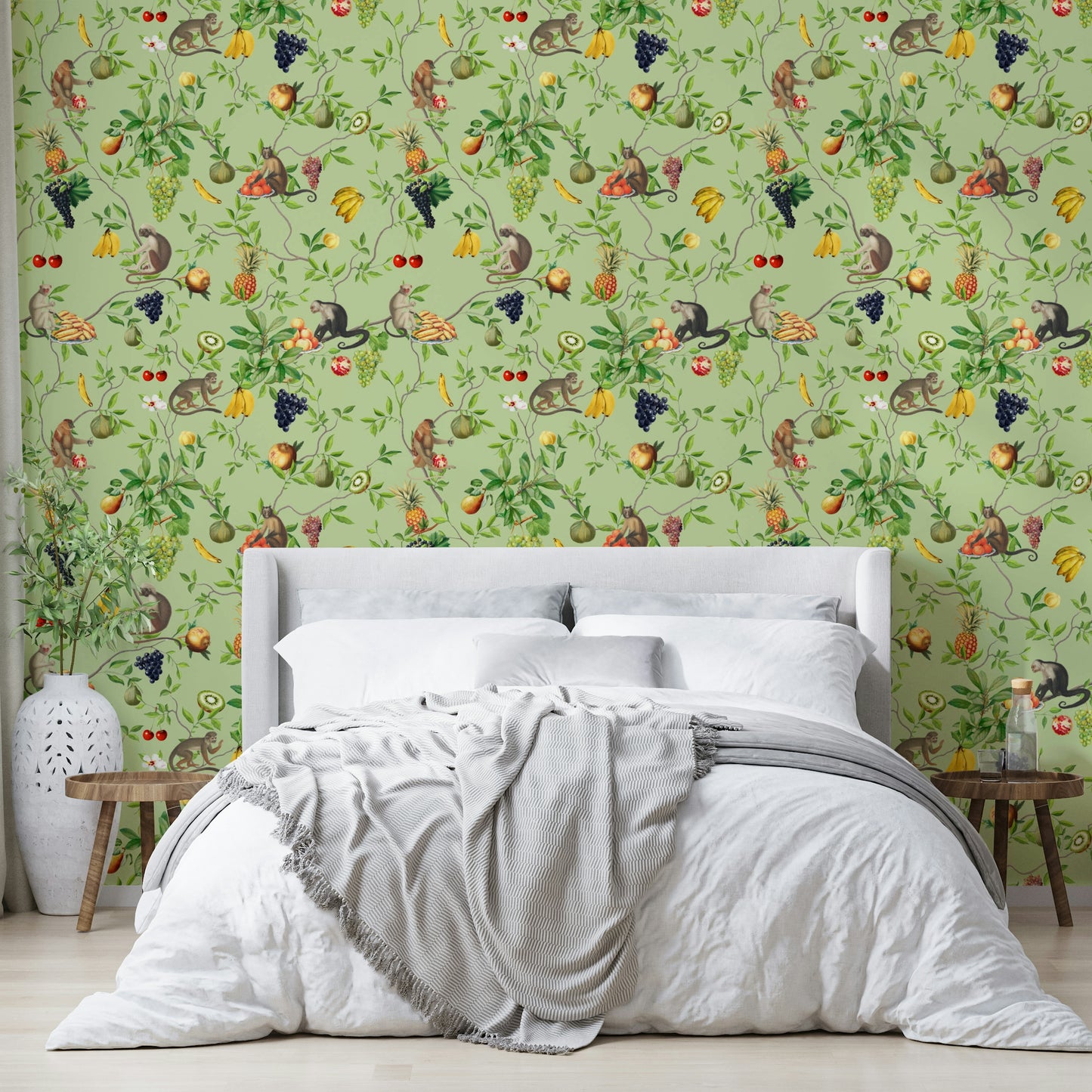 Fun tropical wallpaper with monkeys and fruit details in bold colors.

