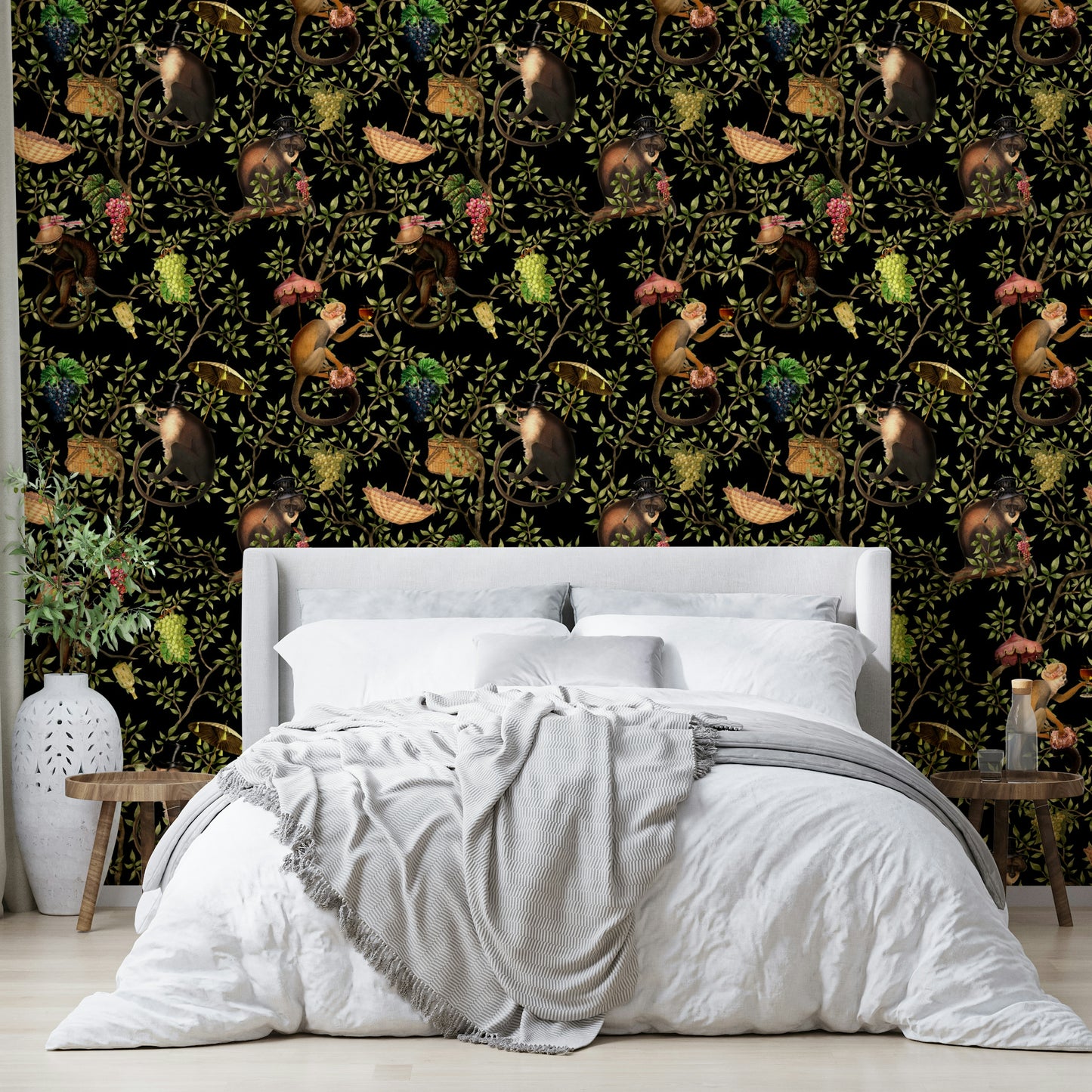Lively jungle wallpaper with monkeys, foliage, and colorful accents.

