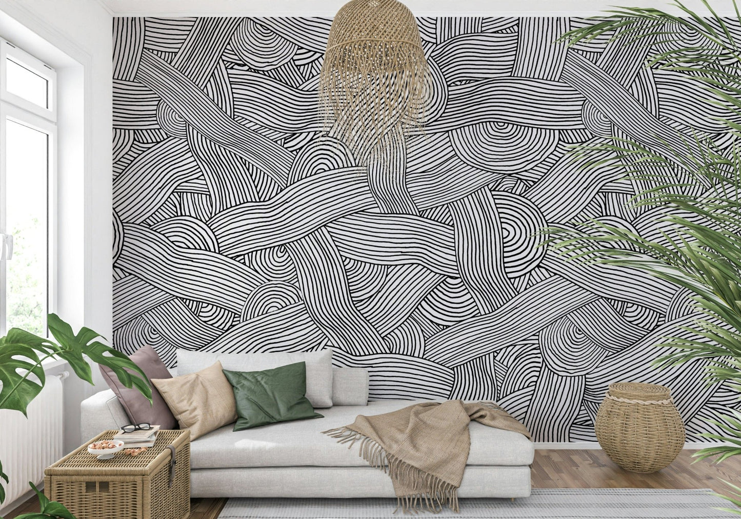 Monochromatic Striped Maze wall mural in black and white behind a white chaise sofa in a living room